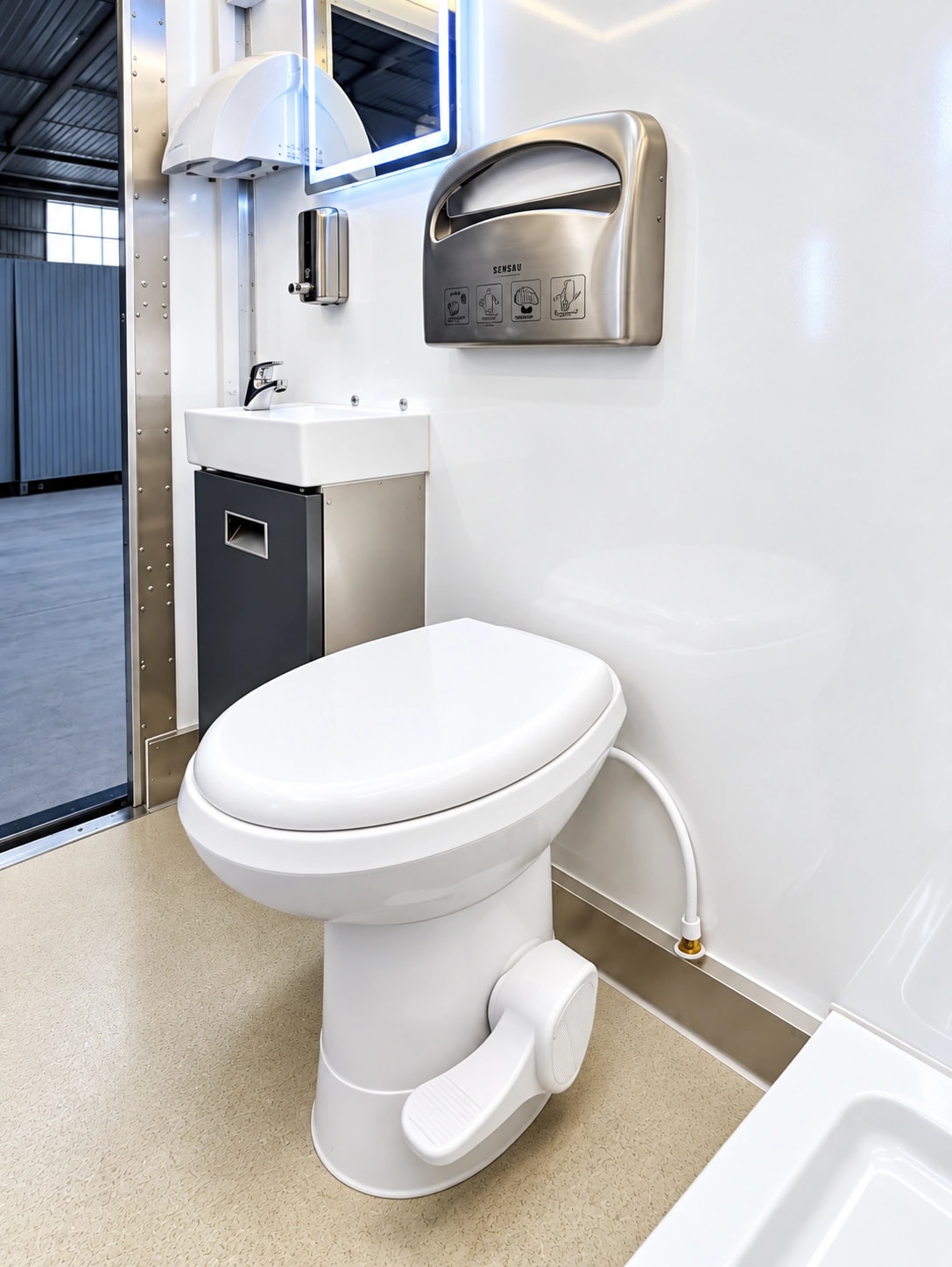 Commercial mobile restroom trailer interior.